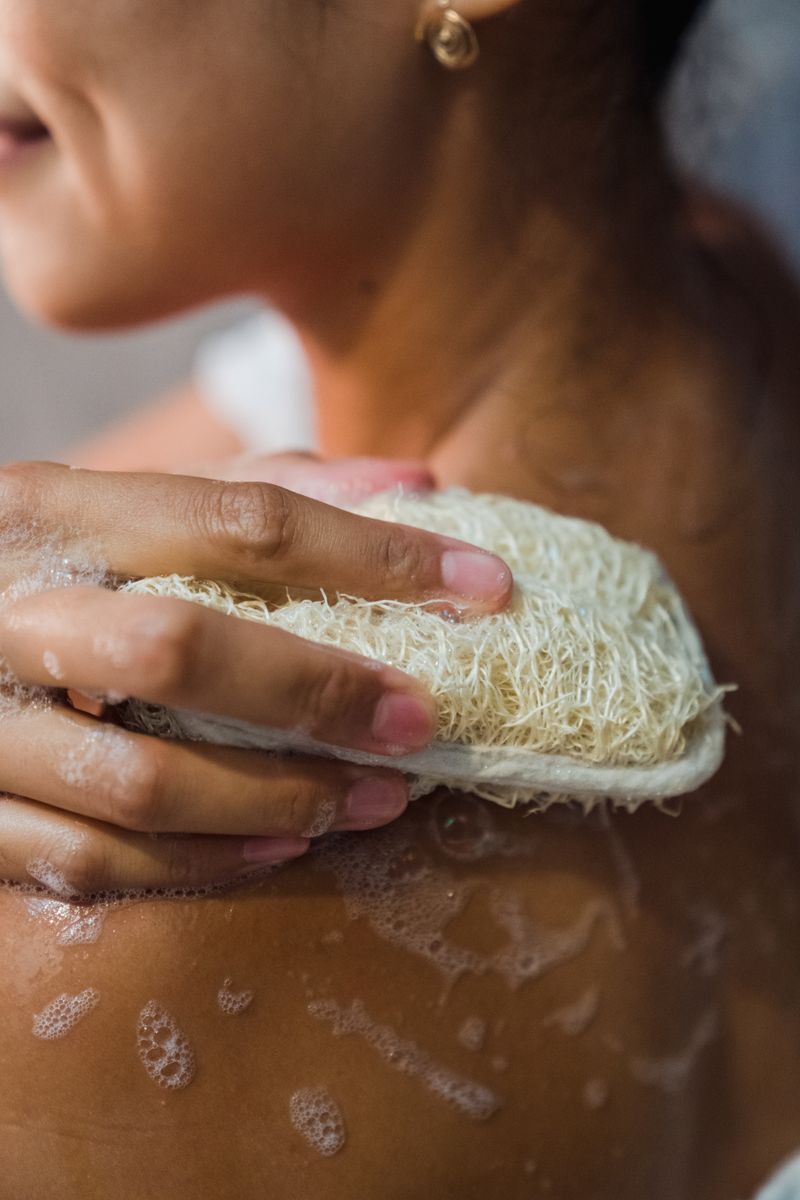 A close-up of a body scrub treatment being applied at a spa