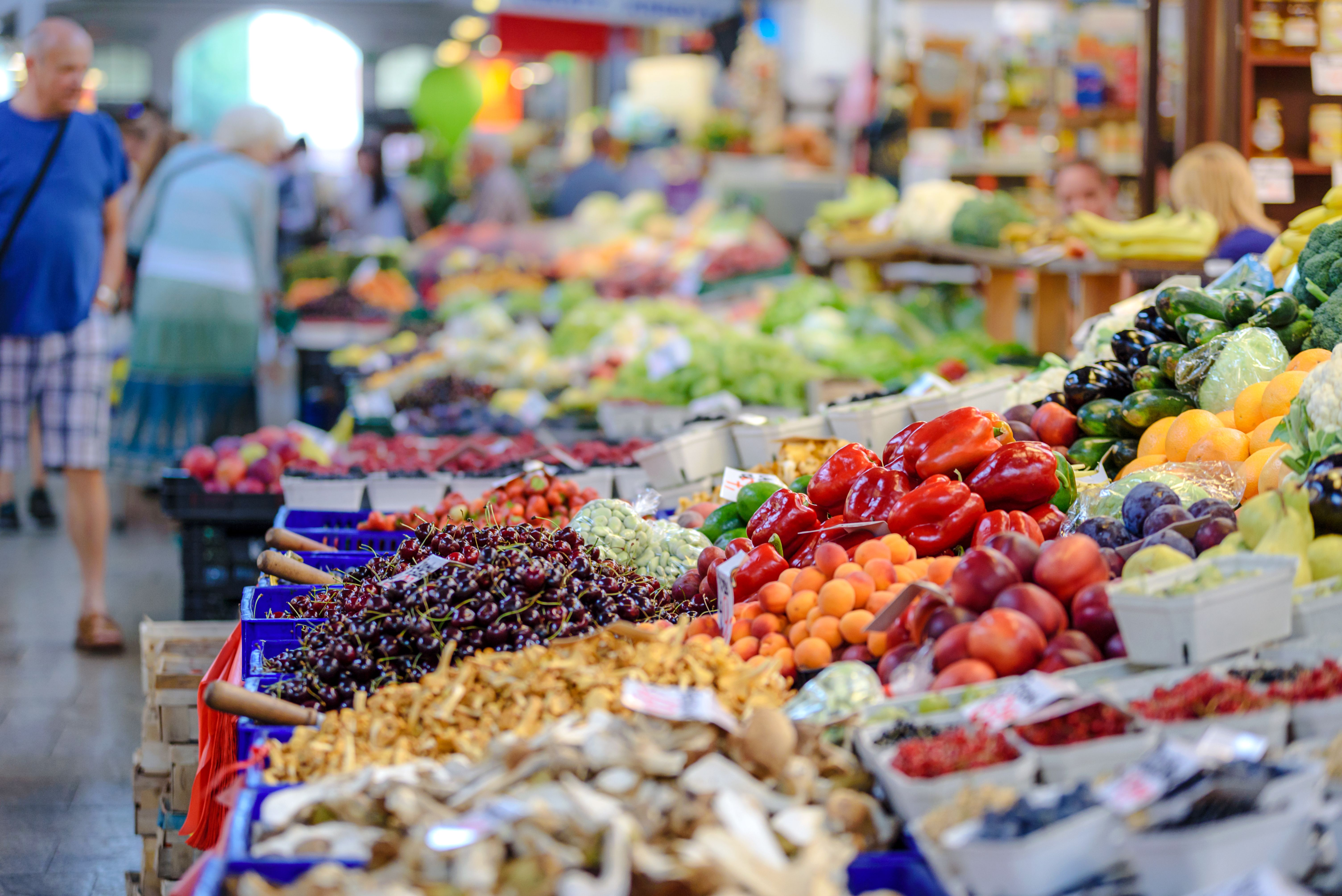 Colourful vegetables displayed at a traditional market stall