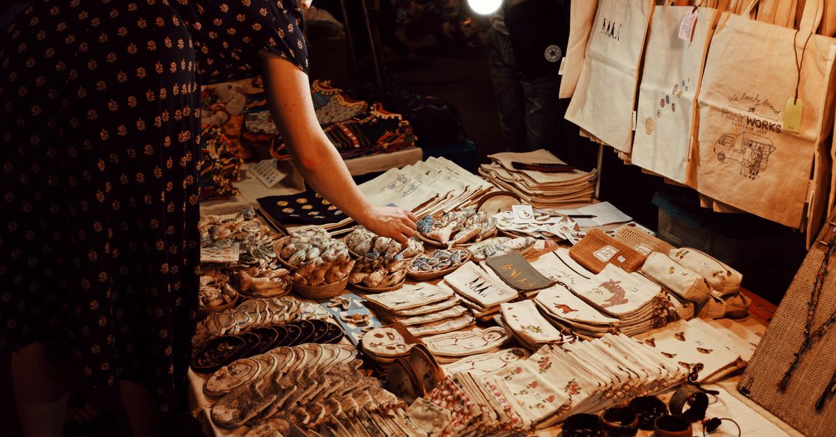 Woman browsing traditional handmade souvenirs at a local market