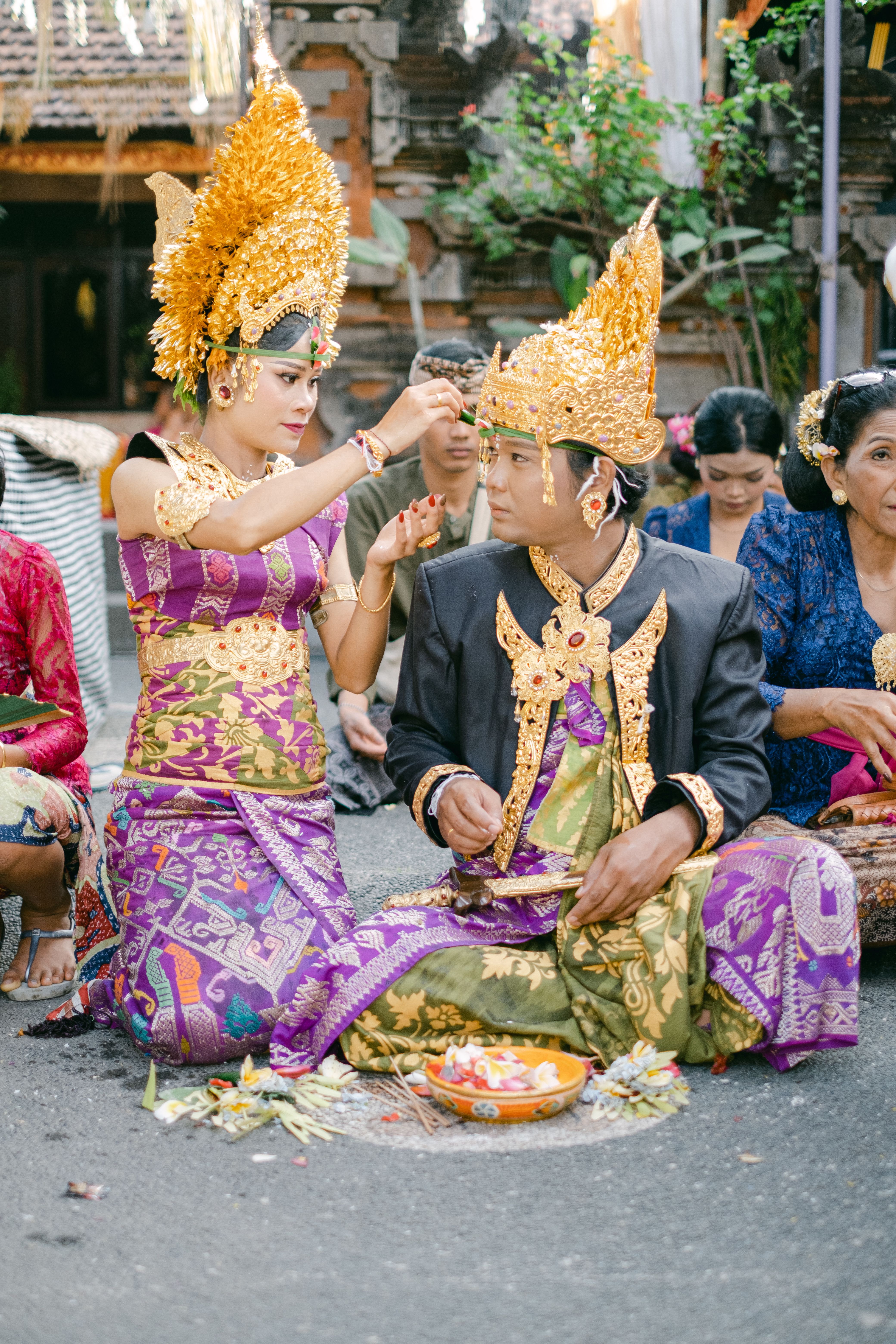 Traditional Balinese ceremony in full ceremonial attire — an example of the rich spiritual traditions visitors should respect