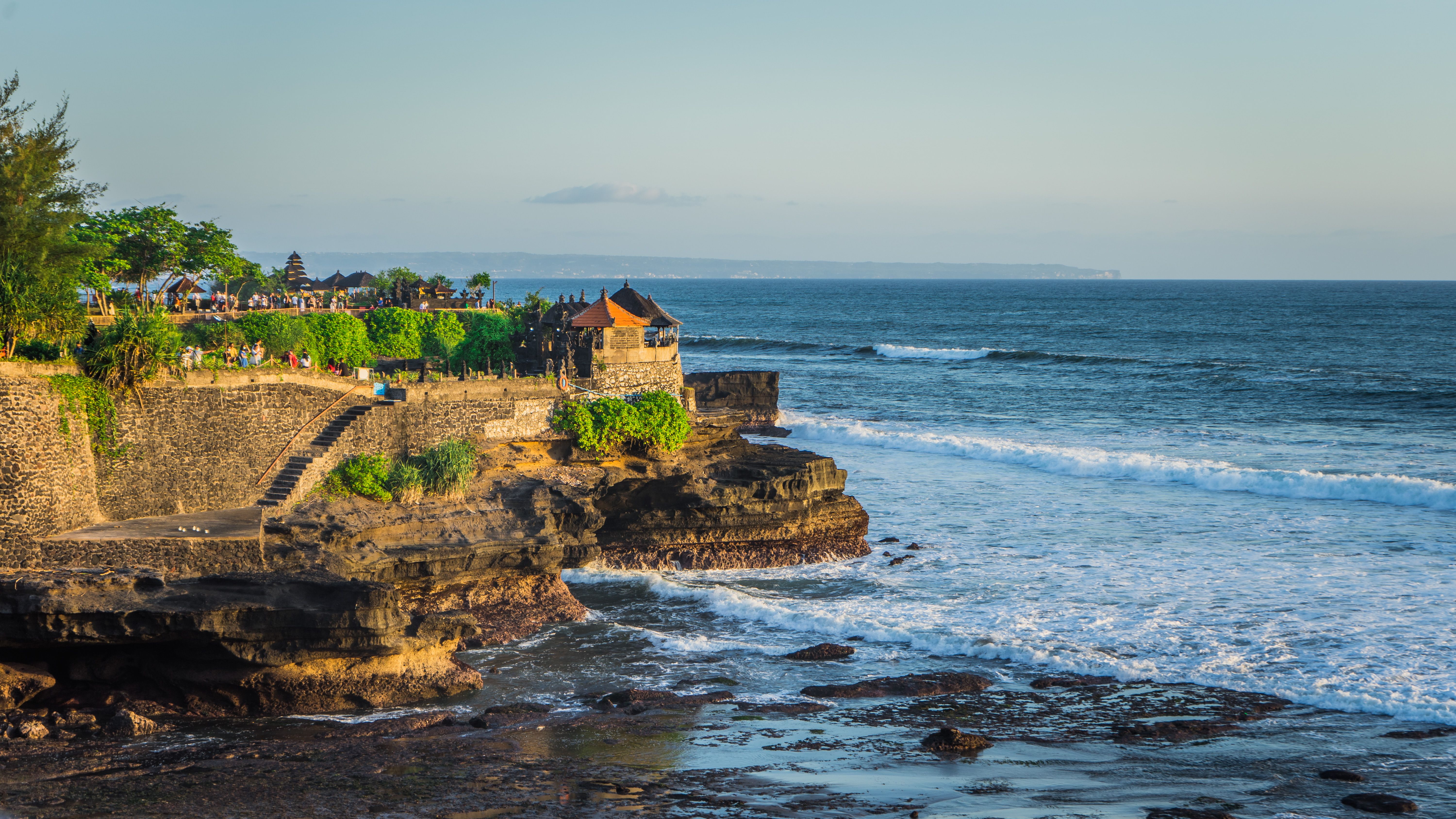 Tanah Lot Temple in Bali, Indonesia — a sacred sea temple silhouetted against the sky, representing Balinese Hindu cultural heritage