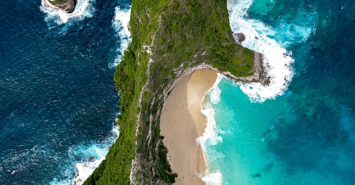 Aerial view of Bali's dramatic coastline — the kind of northern shoreline earmarked for major development